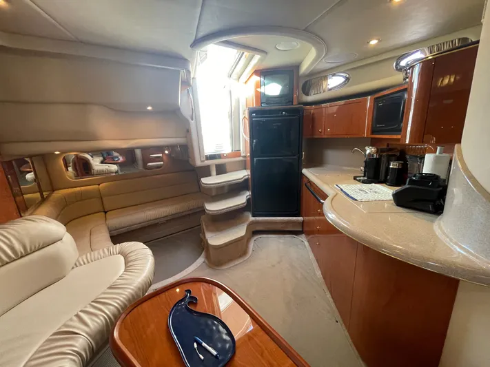  Yacht Photos Pics Luxurious interior of a 2000 Sea Ray 380 Sundancer yacht with modern amenities.