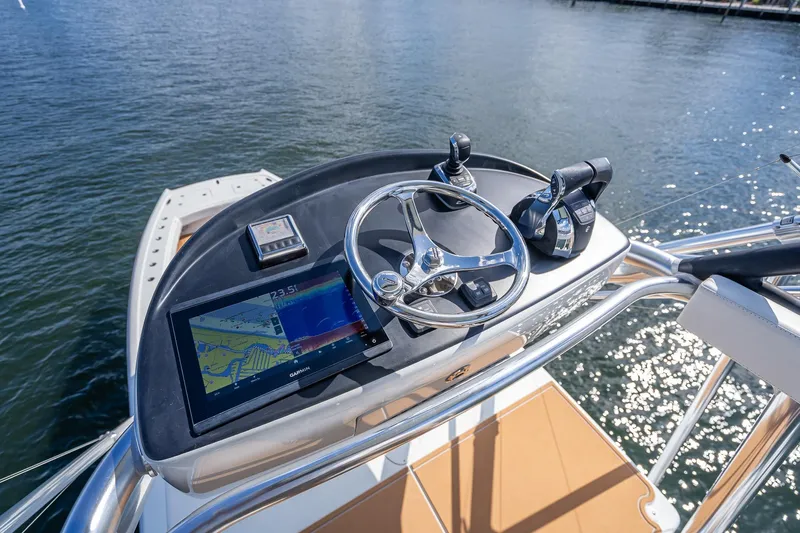  Yacht Photos Pics Freeman 42LR 2019 boat helm with navigation display and controls on water.