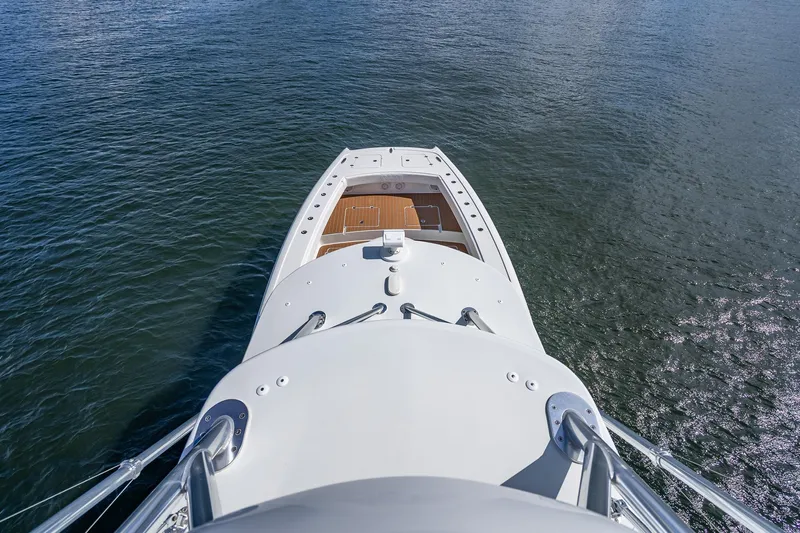  Yacht Photos Pics Aerial view of 2019 Freeman 42LR boat on calm water.