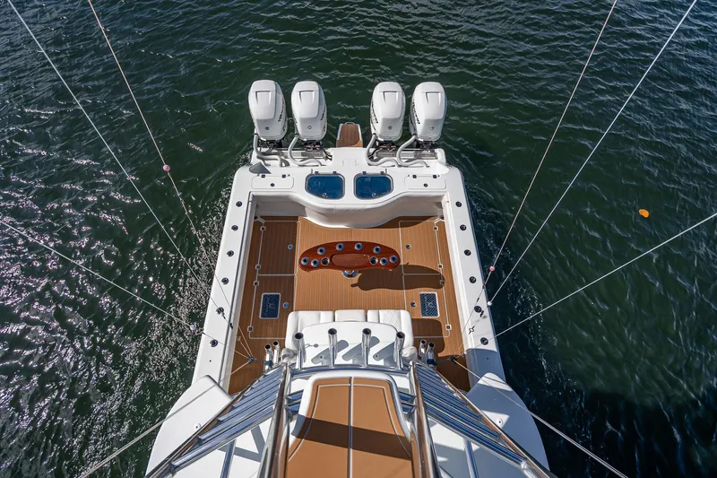  Yacht Photos Pics Aerial view of 2019 Freeman 42LR boat with four engines on water.