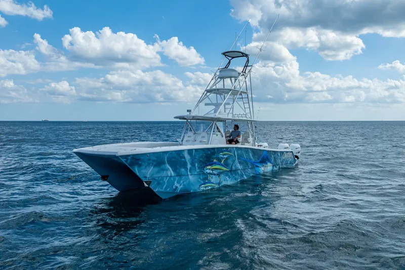  Yacht Photos Pics 2019 Freeman 42LR boat on open sea under cloudy sky.