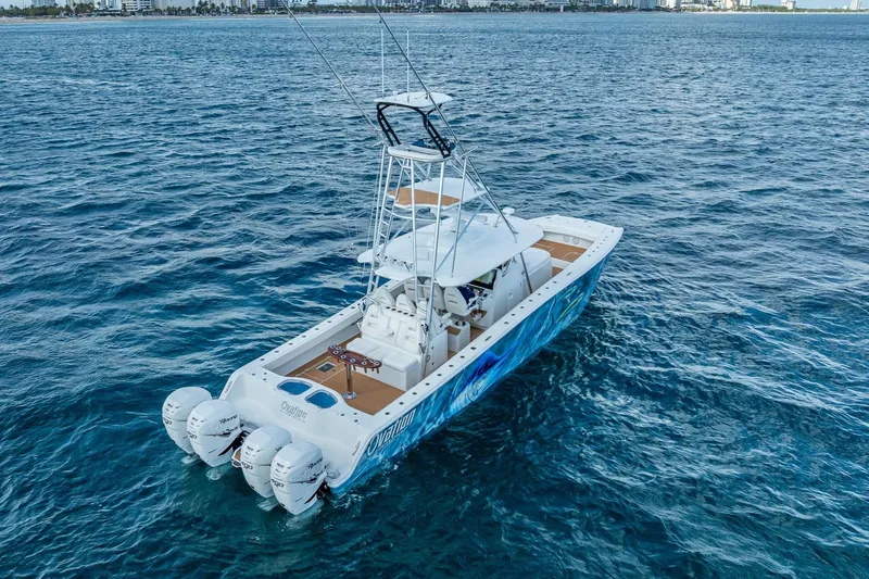  Yacht Photos Pics 2019 Freeman 42LR boat on open water, featuring four powerful outboard engines.