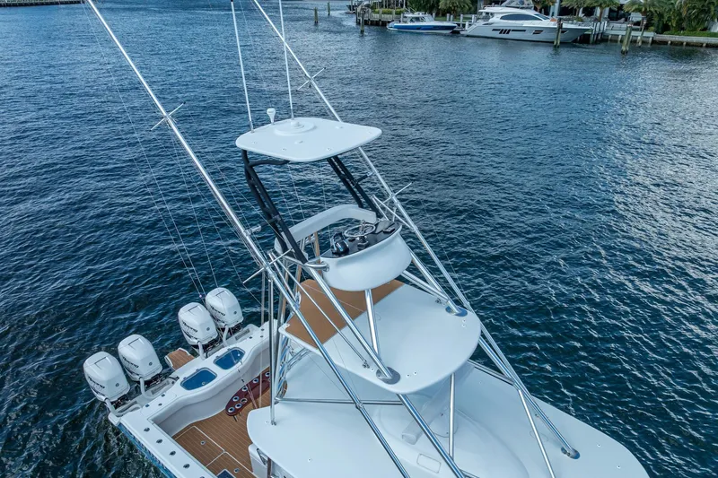  Yacht Photos Pics Aerial view of 2019 Freeman 42LR boat with multiple outboard engines on water.