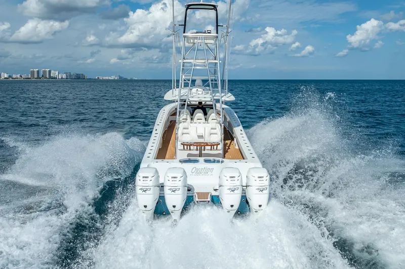  Yacht Photos Pics 2019 Freeman 42LR boat cruising on open ocean with powerful engines.