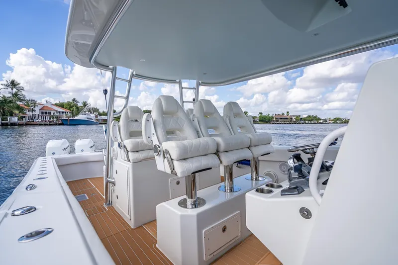  Yacht Photos Pics 2019 Freeman 42LR boat interior with luxurious seating and scenic waterfront view.