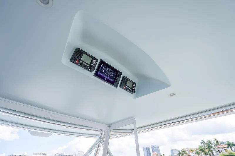  Yacht Photos Pics Ceiling-mounted control panel on 2019 Freeman 42LR boat with navigation equipment.