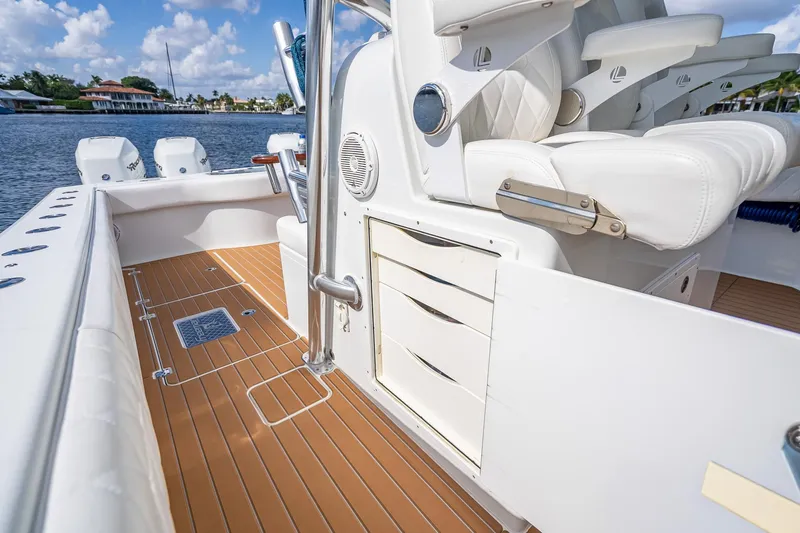  Yacht Photos Pics 2019 Freeman 42LR boat interior with white seating and wooden deck.
