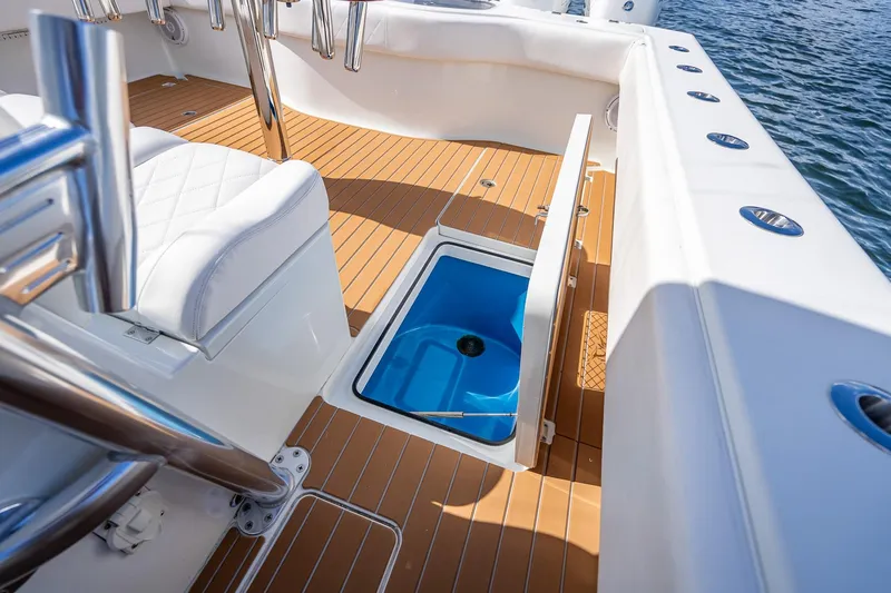  Yacht Photos Pics 2019 Freeman 42LR boat interior with open storage compartment on teak deck.