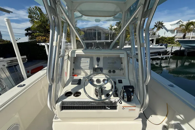  Yacht Photos Pics 2019 SeaVee 340Z boat cockpit with Garmin navigation system and steering wheel.