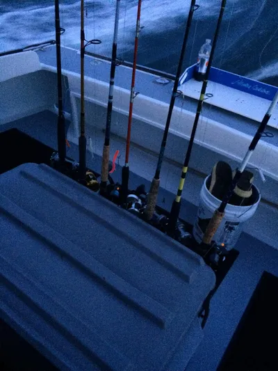  Yacht Photos Pics Fishing rods on a 2002 Northern Bay Fisherman/Cruiser boat at dusk.