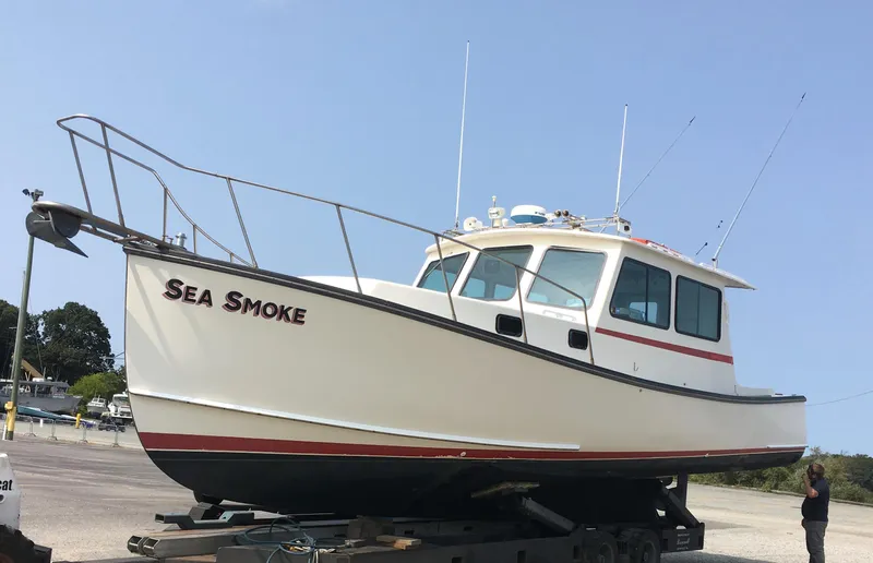  Yacht Photos Pics 2002 Northern Bay Fisherman/Cruiser boat named "Sea Smoke" on a trailer.
