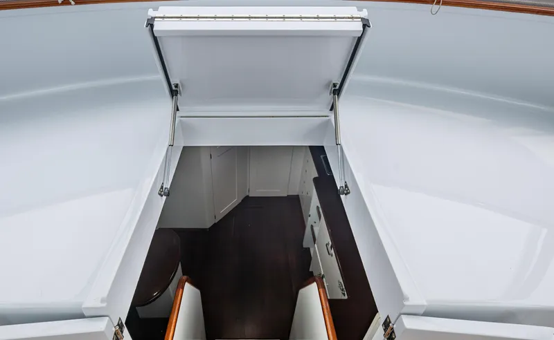 Slippery Slope Yacht Photos Pics Interior view of 2005 Gamefisherman 45 Express boat, showing cabin entrance and stairs.