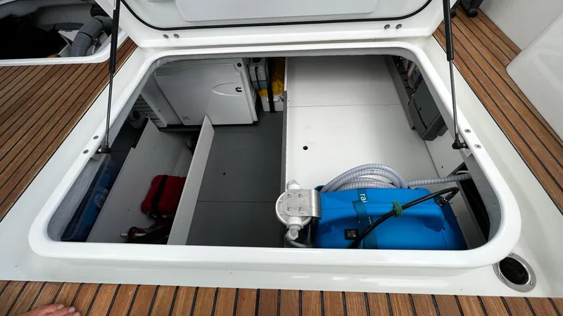 Libertad Yacht Photos Pics Engine compartment of 2020 Beneteau Swift Trawler 44 with visible equipment and storage.
