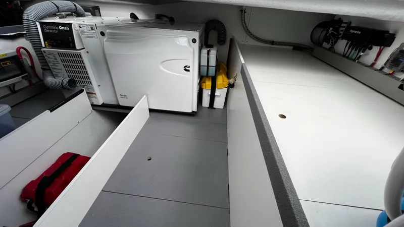 Libertad Yacht Photos Pics Engine room of 2020 Beneteau Swift Trawler 44 with Cummins Onan generator.