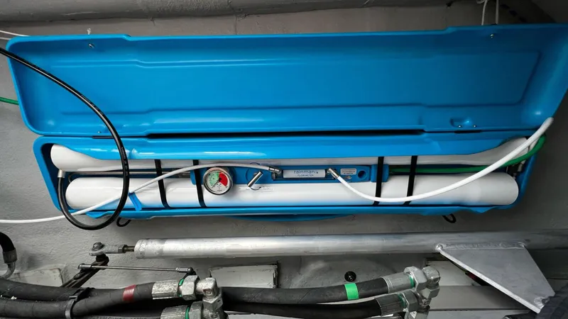 Libertad Yacht Photos Pics Engine room of 2020 Beneteau Swift Trawler 44 with water filtration system.