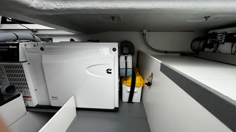 Libertad Yacht Photos Pics Engine room of 2020 Beneteau Swift Trawler 44 with Onan generator and storage.