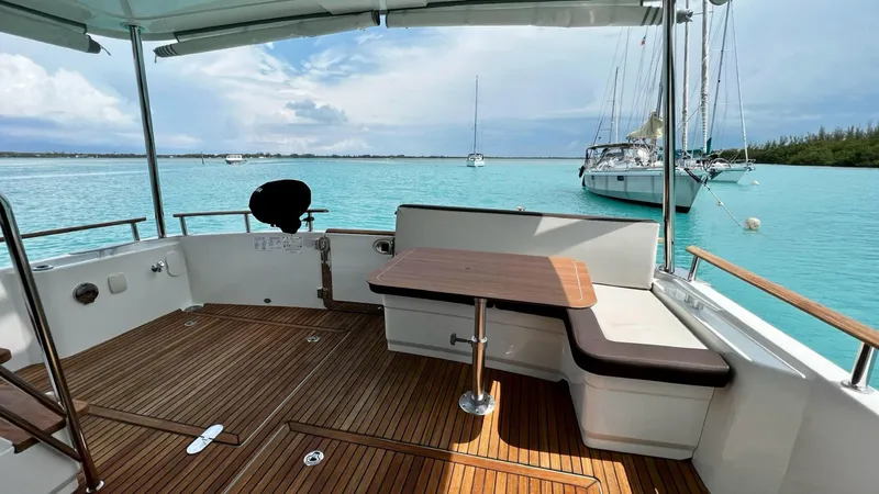Libertad Yacht Photos Pics Beneteau Swift Trawler 44, 2020 model, featuring a spacious deck with ocean view.