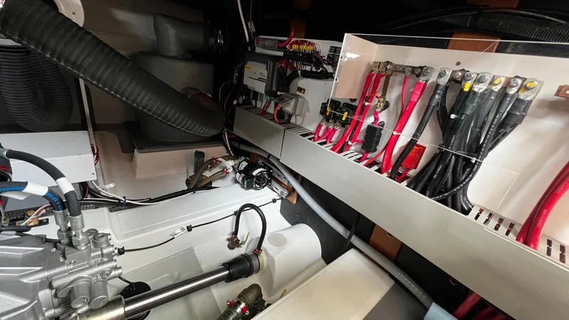 Libertad Yacht Photos Pics Engine room of 2020 Beneteau Swift Trawler 44 with wiring and mechanical components.
