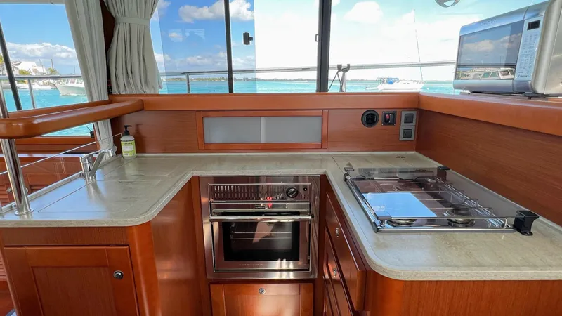 Libertad Yacht Photos Pics Modern kitchen interior on 2020 Beneteau Swift Trawler 44 yacht.