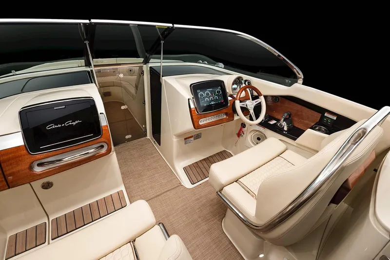  Yacht Photos Pics Manufacturer Provided Image: 2023 Chris-Craft Launch 31 GT interior with luxurious seating and advanced dashboard.