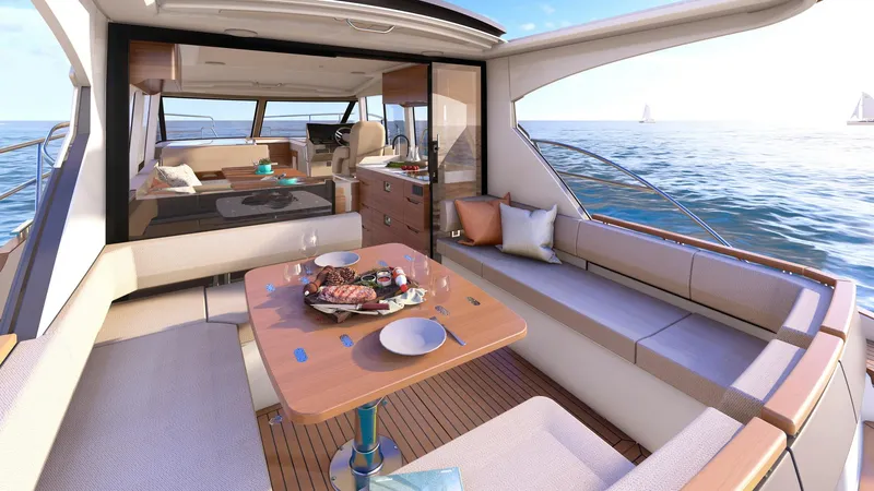  Yacht Photos Pics Luxurious Marex 390 yacht interior, 2025 model, featuring elegant seating and dining area with ocean view.