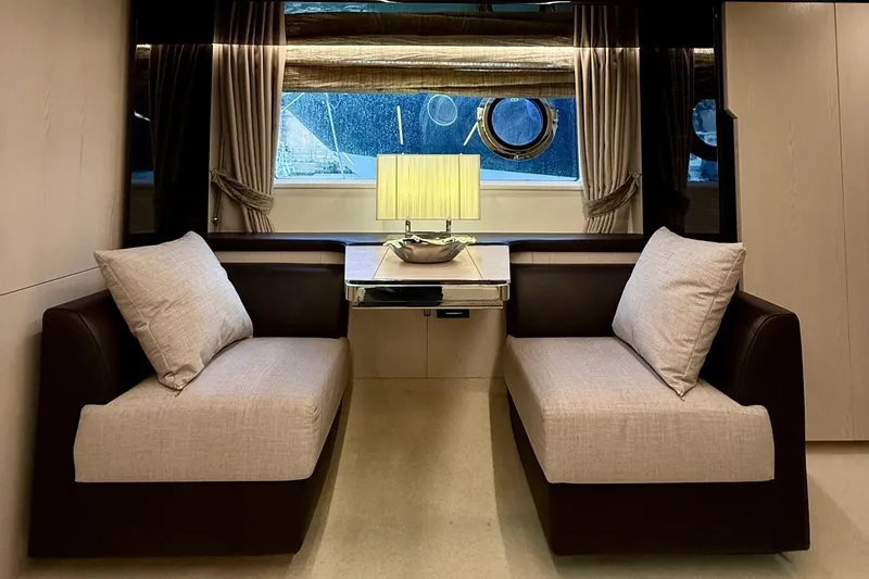  Yacht Photos Pics Luxurious interior of 2017 Azimut 66 yacht with elegant seating and ambient lighting.