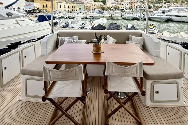  Yacht Photos Pics Luxurious 2017 Azimut 66 yacht deck with elegant seating and marina view.