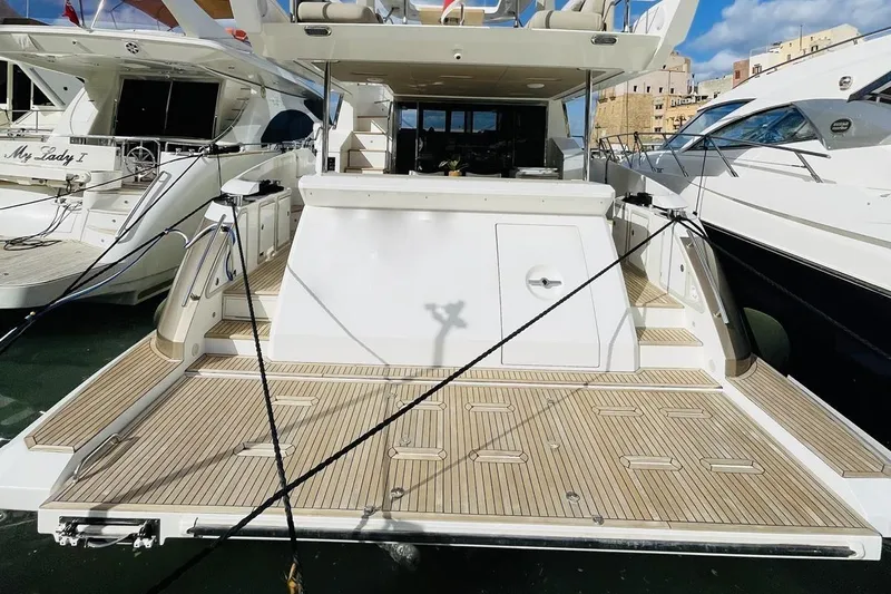  Yacht Photos Pics Azimut 66 yacht, 2017 model, docked with spacious teak deck and modern design.