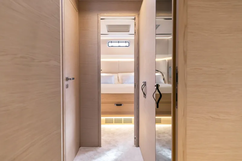 Yacht Photos Pics Luxurious interior of 2024 Solaris Power 52 Open yacht, featuring elegant wood finishes and modern design.