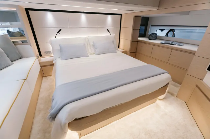  Yacht Photos Pics Luxurious interior of 2024 Solaris Power 52 Open yacht with elegant bedroom design.