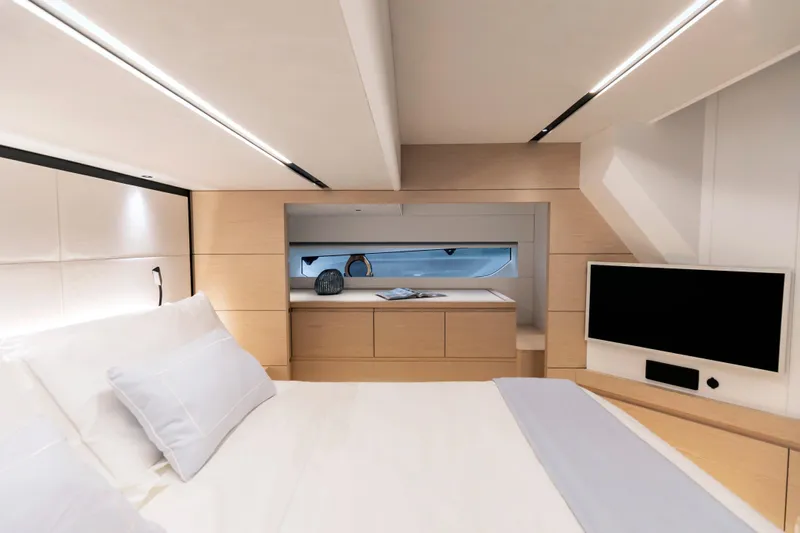  Yacht Photos Pics Luxurious interior of 2024 Solaris Power 52 Open yacht, featuring modern bedroom design.