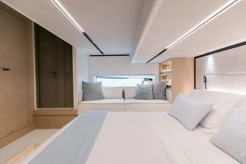  Yacht Photos Pics Luxurious interior of 2024 Solaris Power 52 Open yacht with modern design and cozy seating.