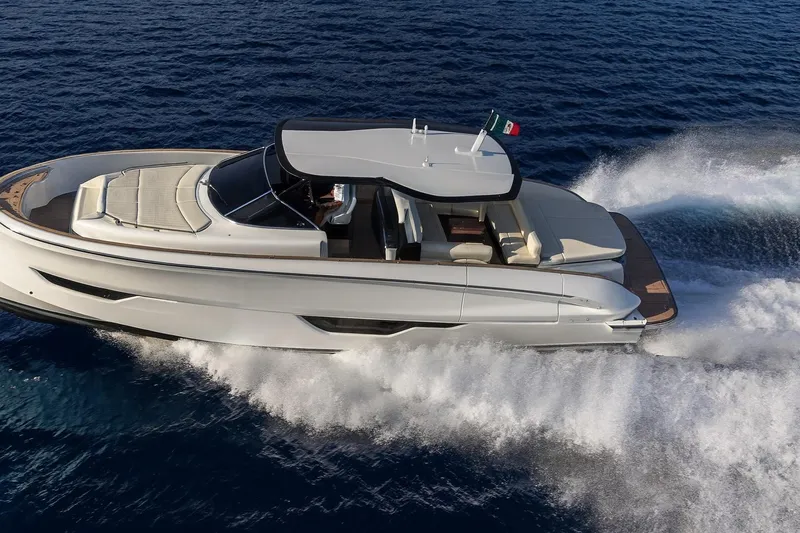  Yacht Photos Pics 2024 Solaris Power 52 Open yacht cruising on open water, showcasing sleek design and luxury.