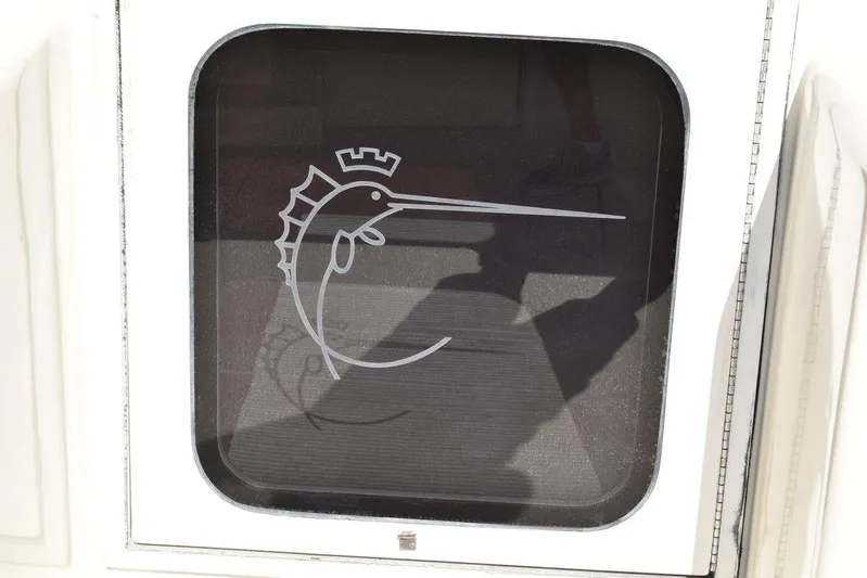  Yacht Photos Pics Egg Harbor 37 Sport Yacht 2005 window with marlin logo design.