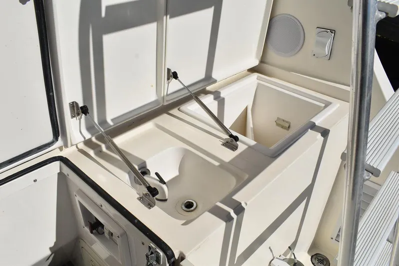  Yacht Photos Pics 2005 Egg Harbor 37 Sport Yacht sink and storage area.