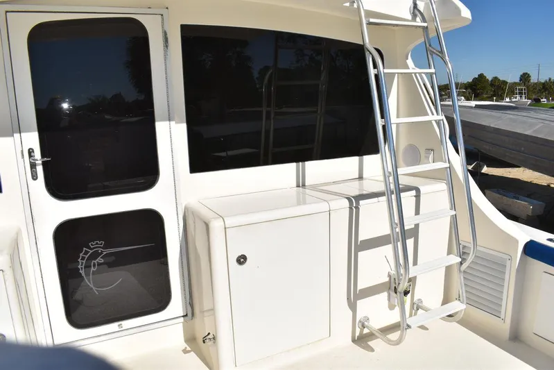  Yacht Photos Pics Egg Harbor 37 Sport Yacht 2005, rear deck with ladder and door.