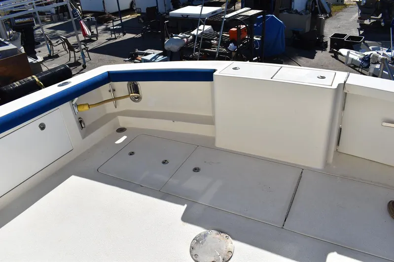  Yacht Photos Pics 2005 Egg Harbor 37 Sport Yacht deck with storage compartments and seating.