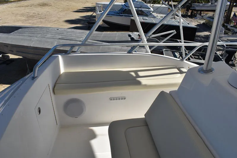  Yacht Photos Pics 2005 Egg Harbor 37 Sport Yacht interior seating area with beige cushions.