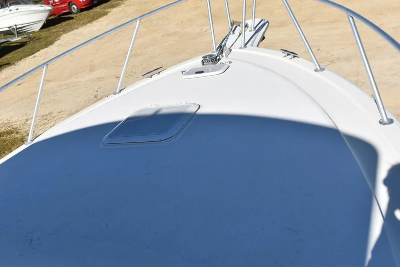  Yacht Photos Pics 2005 Egg Harbor 37 Sport Yacht bow view with railing and hatch.