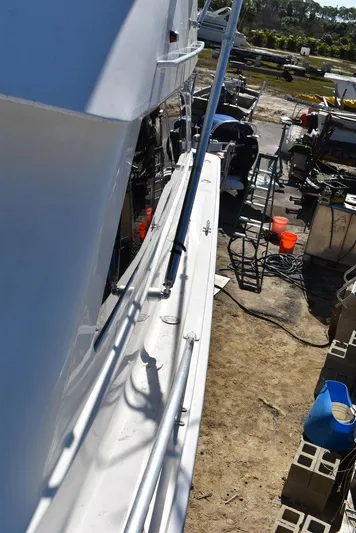  Yacht Photos Pics 2005 Egg Harbor 37 Sport Yacht docked, view of deck and surrounding equipment.