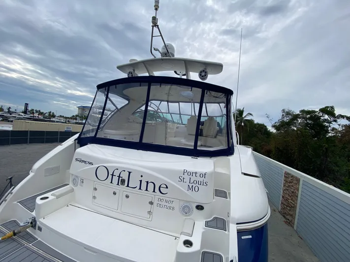 Off Line Yacht Photos Pics 2006 Cruisers Yachts 52 Express at dock, named "OffLine," Port of St. Louis, MO.