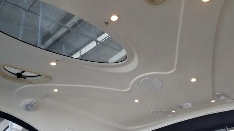 Off Line Yacht Photos Pics Interior ceiling of 2006 Cruisers Yachts 52 Express with skylights and recessed lighting.