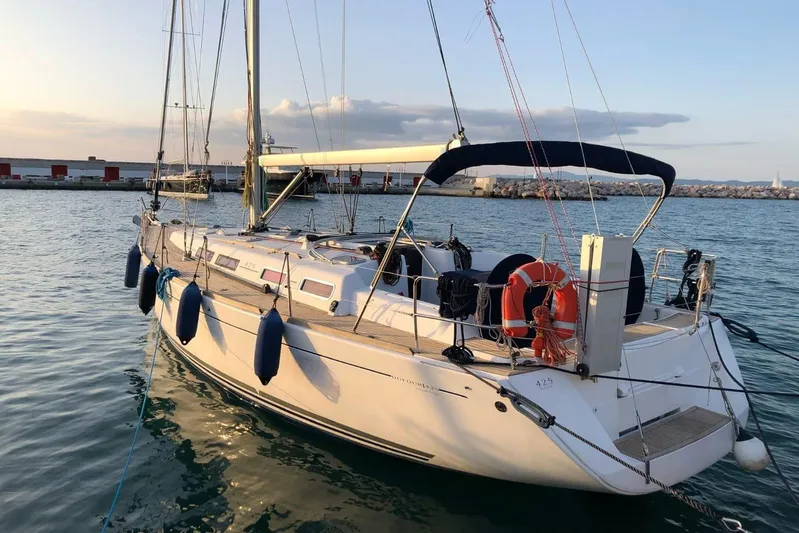  Yacht Photos Pics 2007 Dufour Yachts 425 Grand Large sailboat docked in a serene harbor.