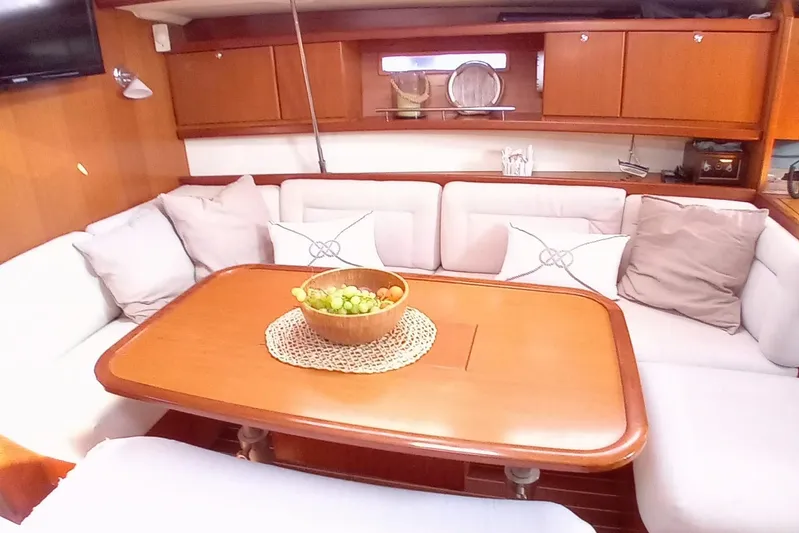  Yacht Photos Pics Cozy interior of 2007 Dufour Yachts 425 Grand Large with elegant dining area.