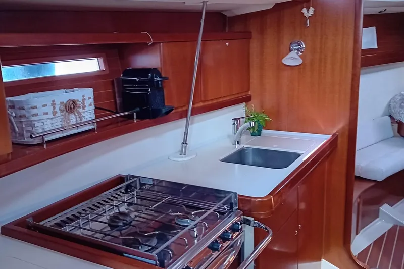  Yacht Photos Pics Interior of 2007 Dufour Yachts 425 Grand Large, featuring a compact kitchen area.