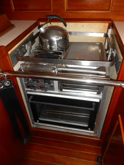 Dutchess Yacht Photos Pics 1985 Contest 41 Ketch yacht kitchen with stove and kettle.