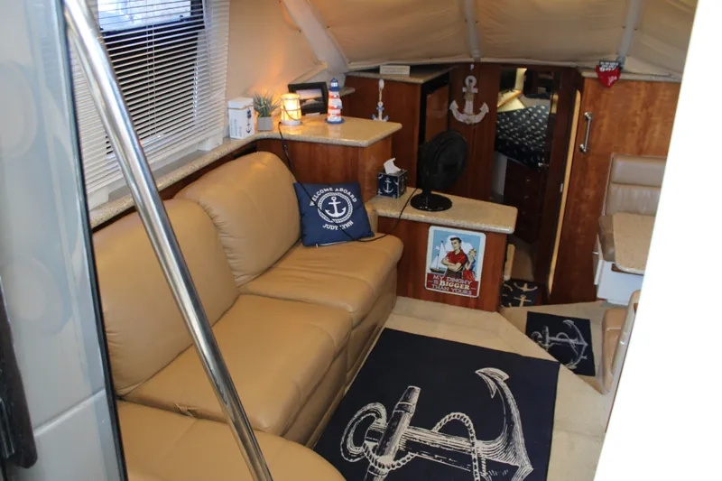  Yacht Photos Pics Interior of 2002 Carver 356 Motor Yacht with nautical decor and beige seating.