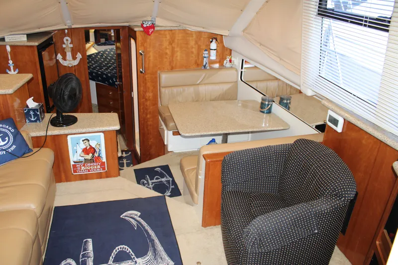  Yacht Photos Pics Interior of 2002 Carver 356 Motor Yacht with cozy seating and nautical decor.