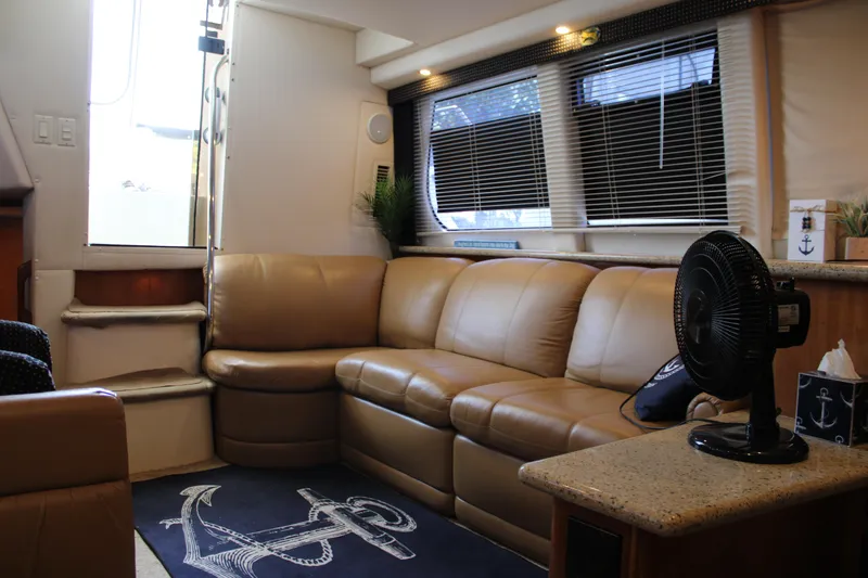  Yacht Photos Pics Interior of 2002 Carver 356 Motor Yacht with leather seating and nautical decor.