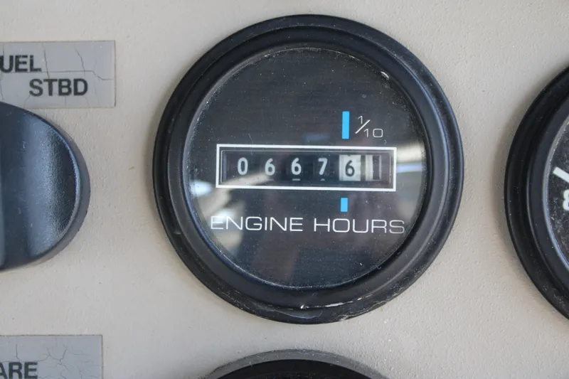  Yacht Photos Pics Close-up of engine hours gauge reading 6761 on 2002 Carver 356 Motor Yacht.